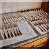 K14. Set of Cristofle "Oceana" silverplate flatware. 53 pieces 